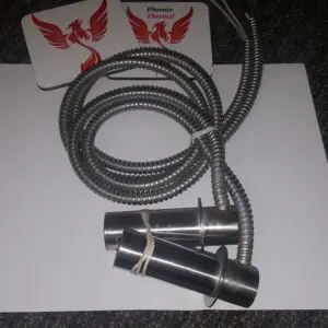 A pair of jump ropes are tied to the side of a white table.