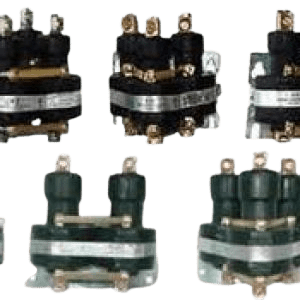 A group of different types of switches on a green background.