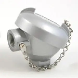 A silver metal object with chain hanging from it.