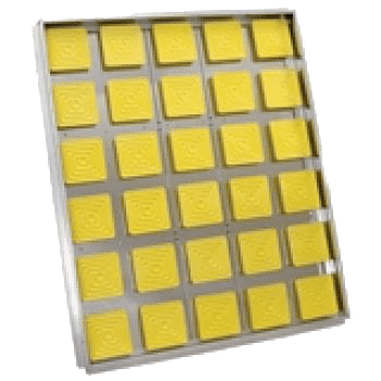 A yellow tile tray with many squares on it.