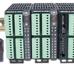 A group of electronic devices that are connected to a power strip.