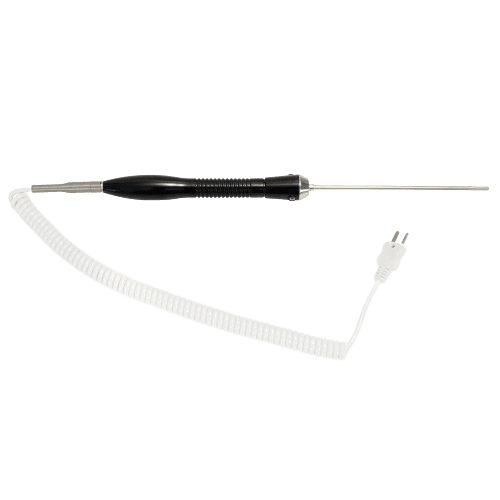 A white and black electric cord is connected to an electrical device.