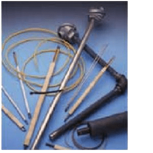 A group of various tools and wires on top of a table.