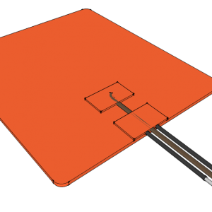 A computer screen with an orange cover and two wires.