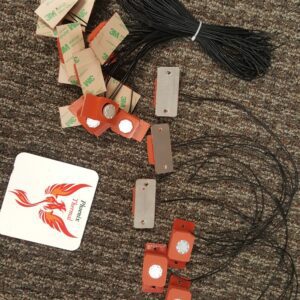 A bunch of cords and some cards on the floor