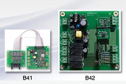 A series of electronic boards with different types of wires.