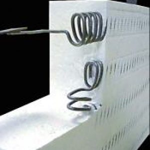 A white wall with two springs attached to it.